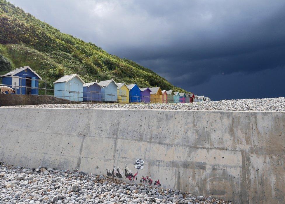 'Luxury rentals only' mural, said to be by Banksy, at Cromer