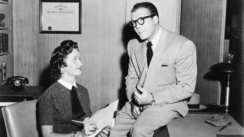 Noel Neill as Lois Lane and George Reeves as Superman in a still from Adventures of Superman c. 1955.