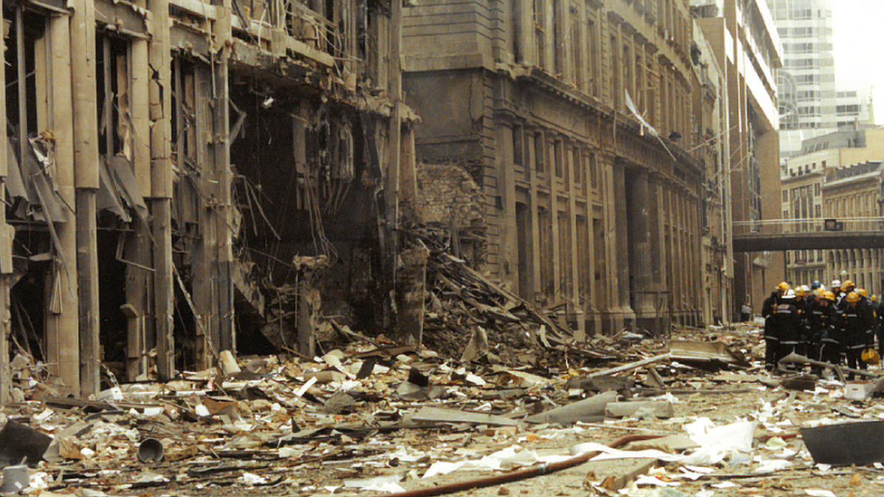 Debris from the Bishopsgate bombing strewn across the street