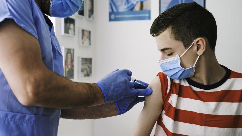 boy getting injection