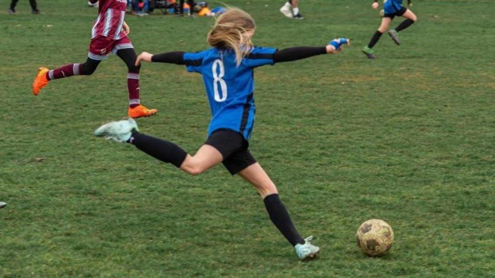 Lola playing football in Bedford