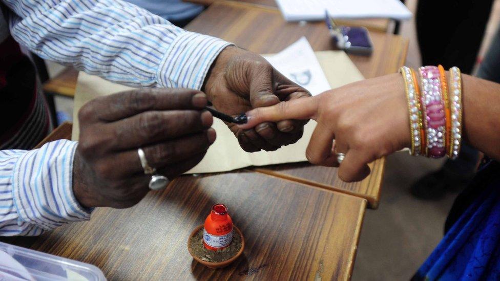 Voter's finger being marked