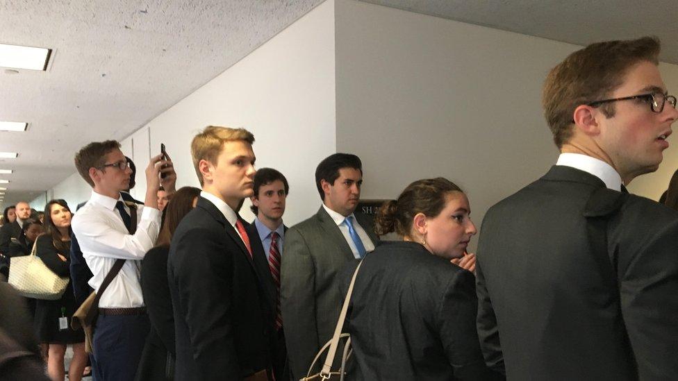 People queue up to hear testimony