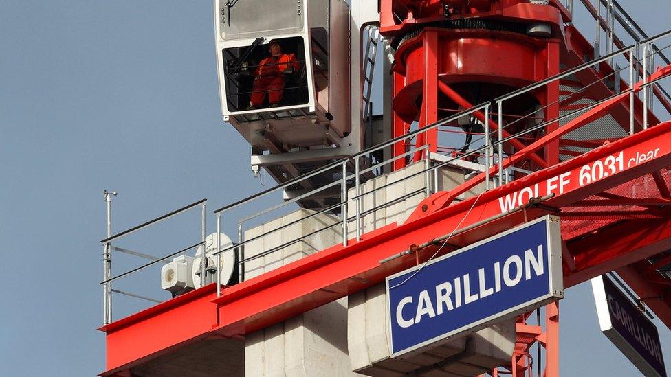 Crane with Carillion sign on it