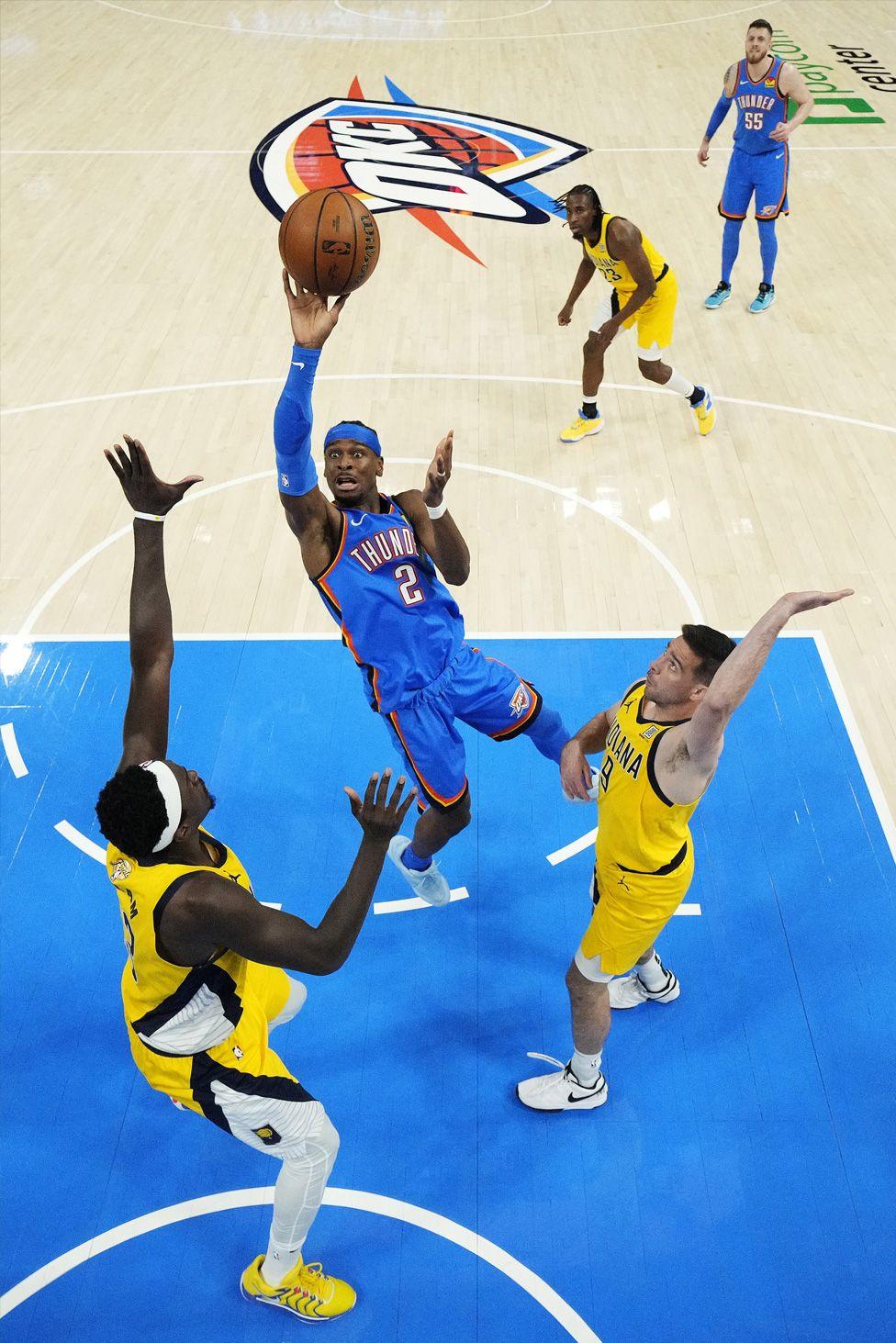 Shai Gilgeous-Alexander of the Thunder attempts a shot against the Indiana Pacers during the first quarter in Game Two of the 2025 NBA Finals in Oklahoma City. Photo by Matthew Stockman