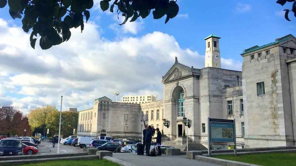 Southampton Civic Centre - a grand, white stone building with wide steps leading to a large archway. There is also a white clocktower in the background