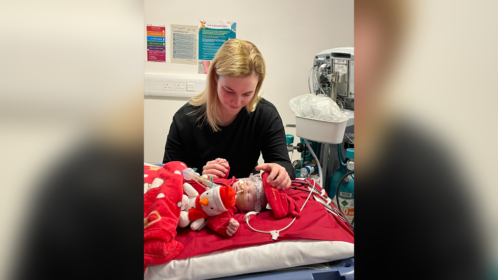 Emma and George in hospital