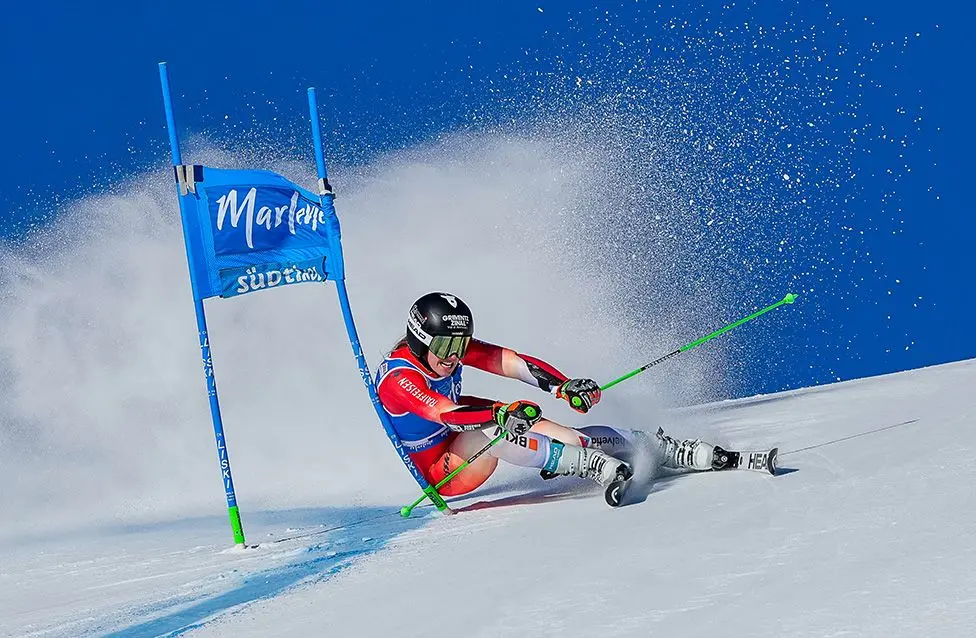Camille Rast competes in the giant slalom at the Alpine Ski World Cup event in Kronplatz, Italy. Photo by Millo Moravski