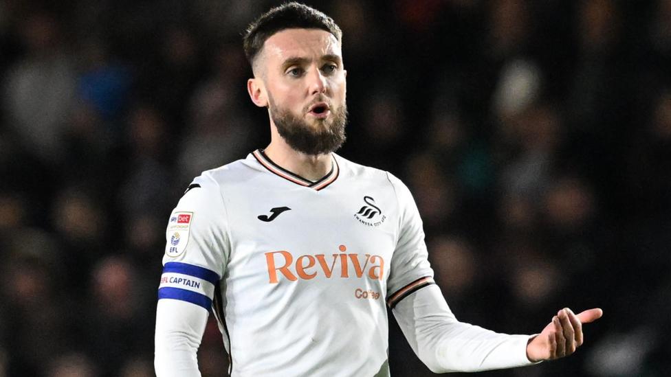 Former Swansea City captain Matt Grimes