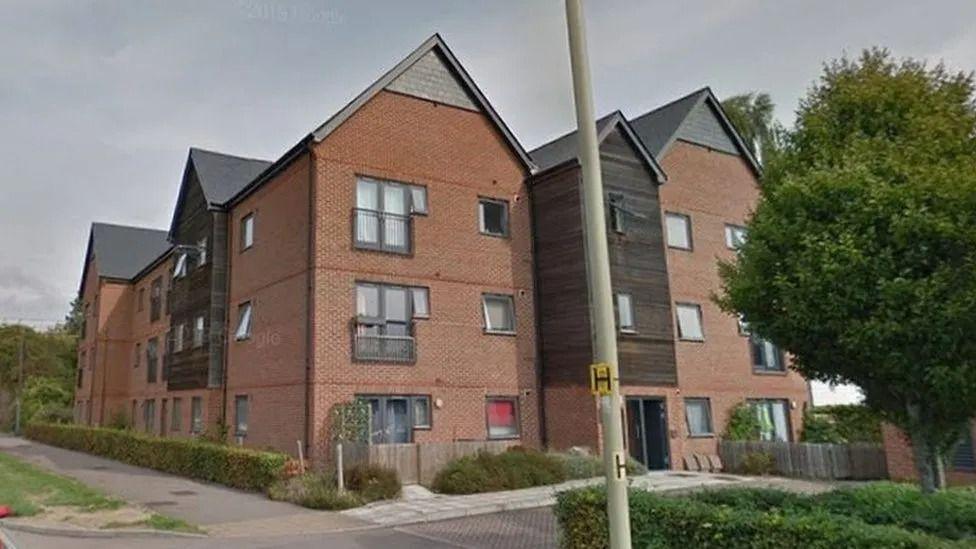 A brick block of flats taken from a Google maps screenshot