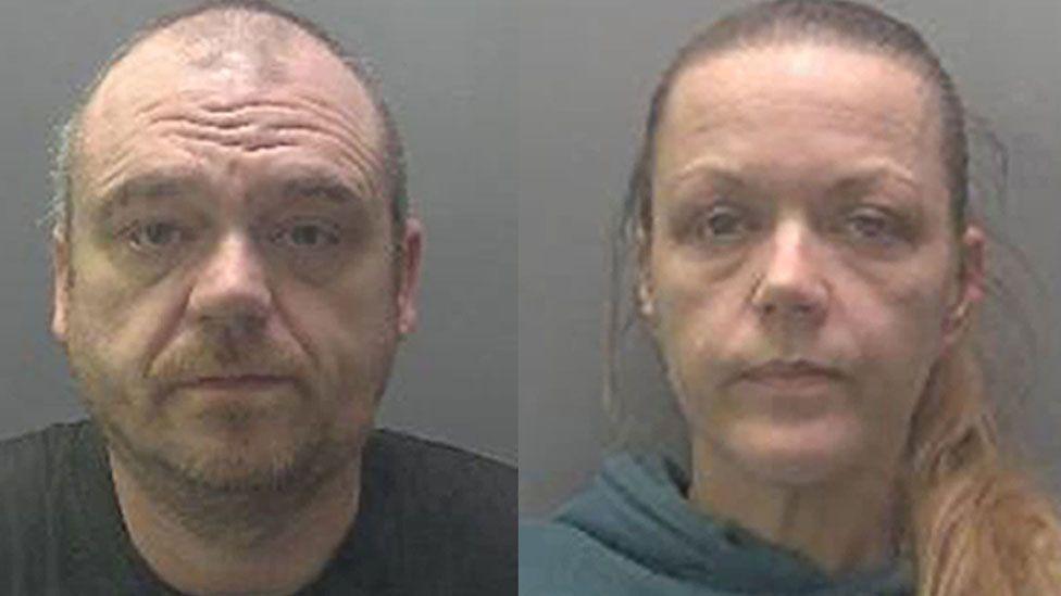 A composite of two police mug shots. On the left is Daniel Williamson, who has stubble and is wearing a black T-shirt. On the right is Leanne Potter-Williamson, who has long fair hair scraped back from her head and in a pony tail over her shoulder. She is wearing a mid-blue hoddie. 
