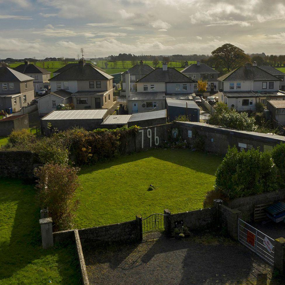 A general view of the former site of the Bon Secours Mother and Baby home and the memorial garden where it is believed 796 children are buried can be seen on February 21, 2024 in Tuam, Ireland.