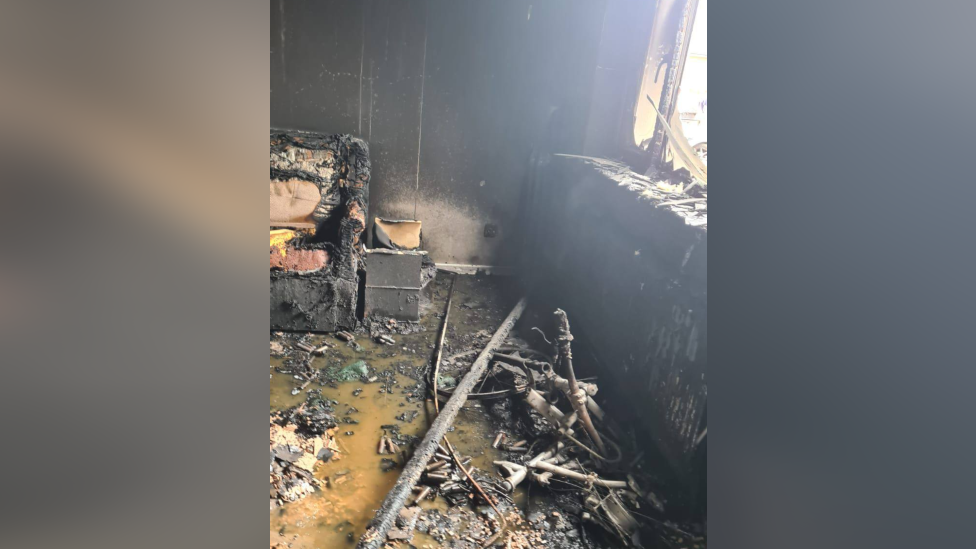 A fire -damaged front room