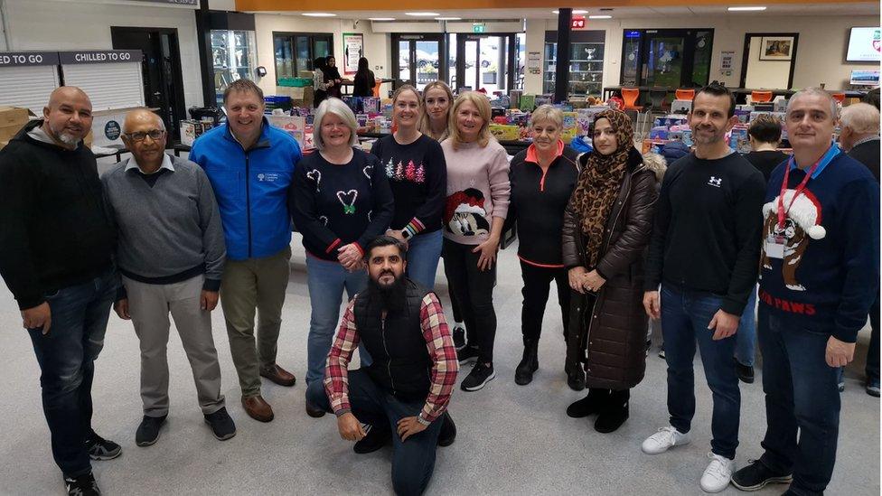 Members of the Luton Foodbank with staff from Chiltern Academy