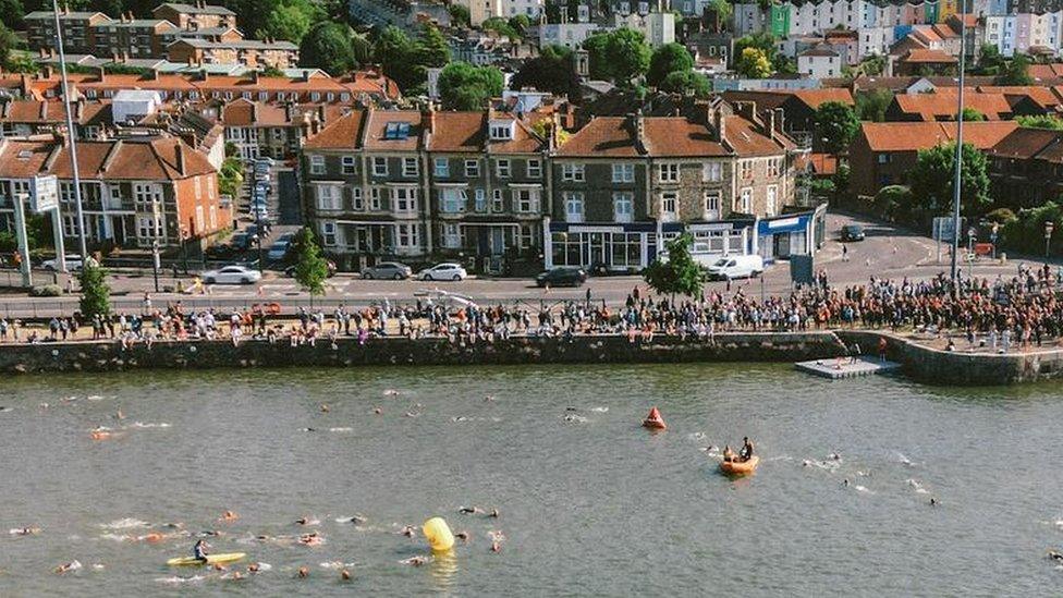 Participants in the triathlon swimming