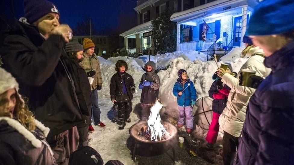 Residents of Belt Road make the best of the snowstorm with a post-blizzard bonfire, complete with roasted marshmallows and mulled wine (24 January 2016)