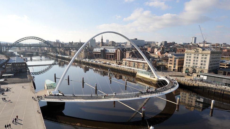 Gateshead's Millennium Bridge and Newcastle's Tyne Bridge