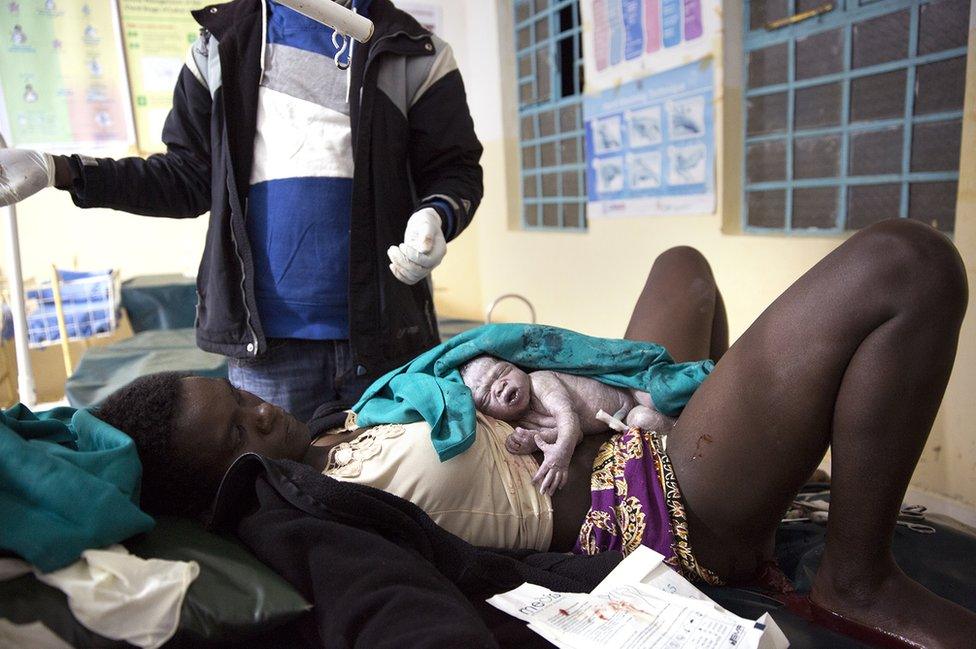 Nelly gives birth to her baby Bieke at a maternity unit in Bungoma, Kenya.