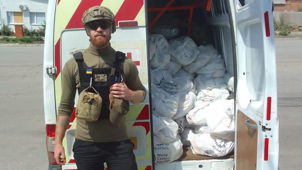 Ryan Williams with aid van in Ukraine