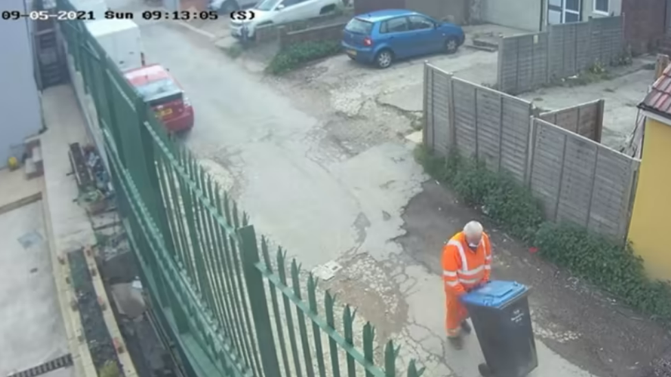 CCTV image of Paizan pushing a a wheelie bin, believed to contain the body of Agnes Akom