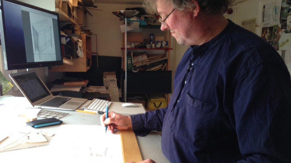 Patient in his work as a furniture designer