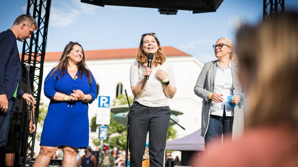 Jamila Schäfer speaking at an event