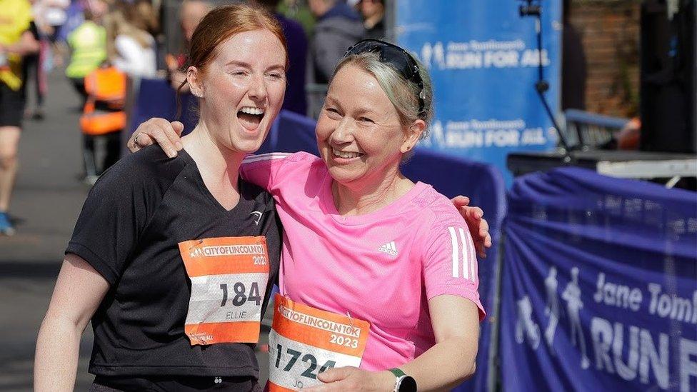 Runners crossing the finishing line