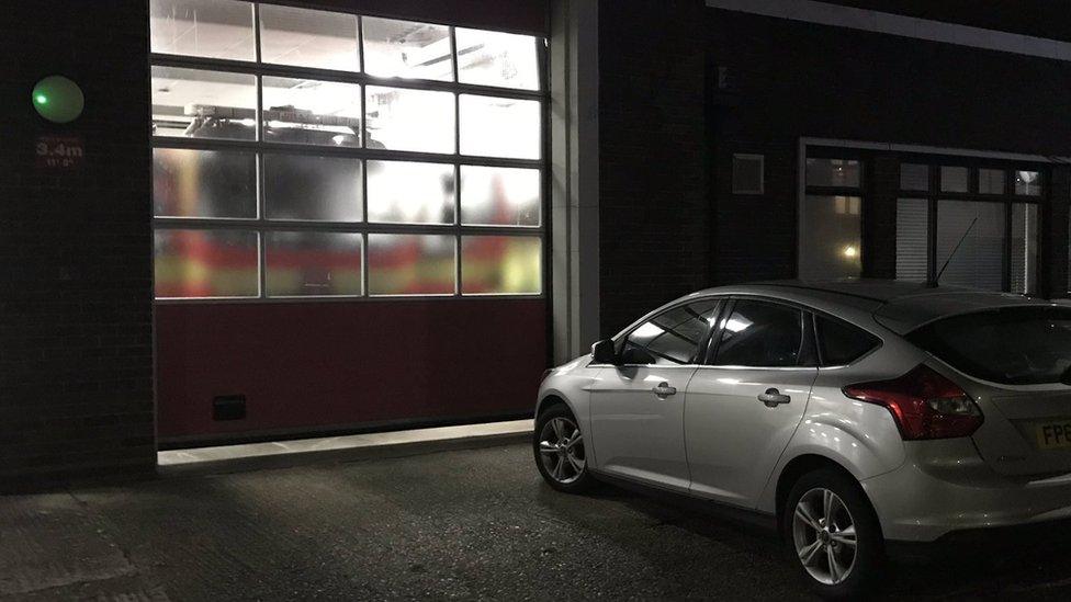 Car blocking fire station