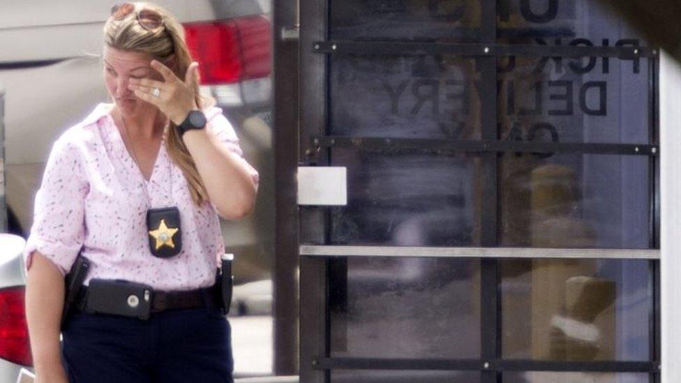 A law enforcement official at the entrance to the shooting crime scene in Orlando (05 June 2017)