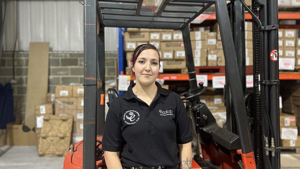 Qualified apprentice Anni Sanders with a forklift truck