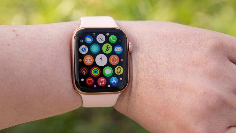 A woman wearing an Apple Watch