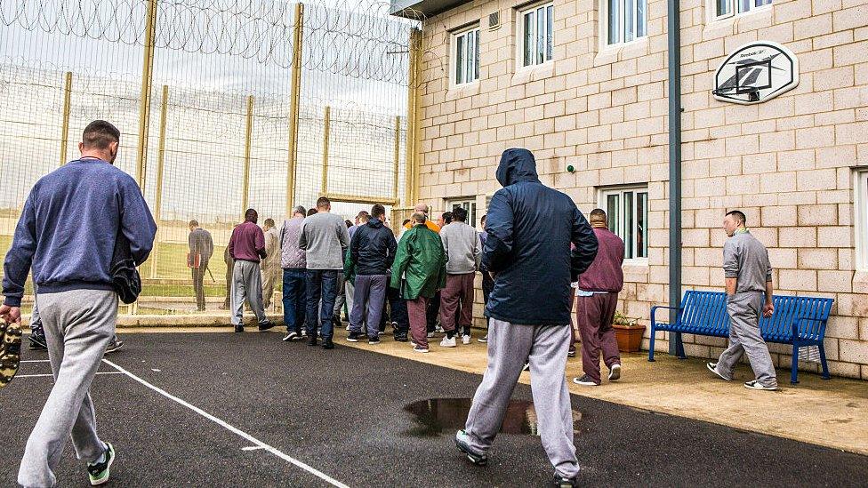 Prisoners leaving to go to work