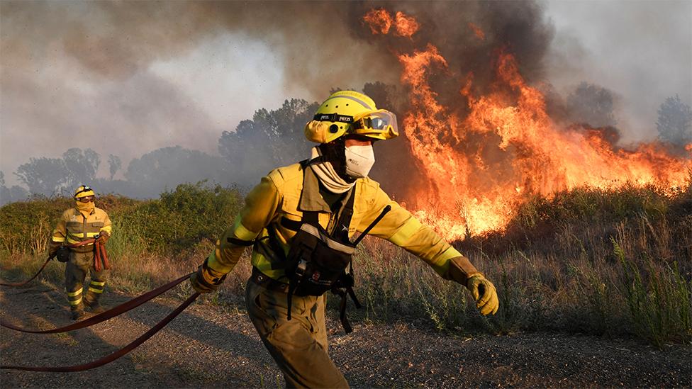 Firefighters battle fires in Spain