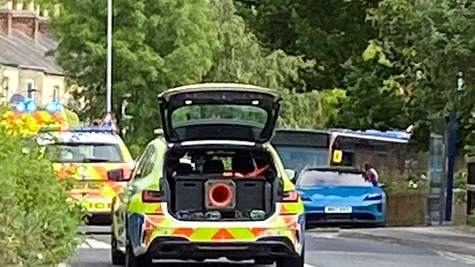 Police vehicles at crash scene