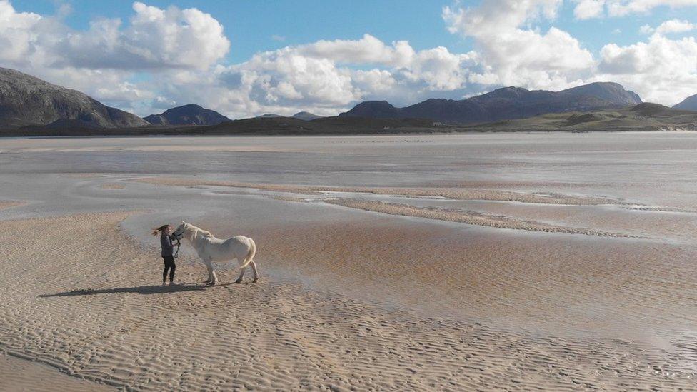 Kate Macleod and pony on beach