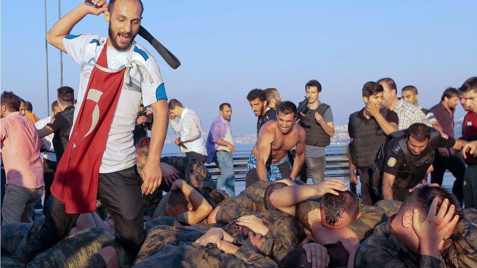 Surrendered Turkish soldiers who were involved in the coup are beaten by a civilian on Bosphorus bridge in Istanbul, Turkey, July 16, 2016