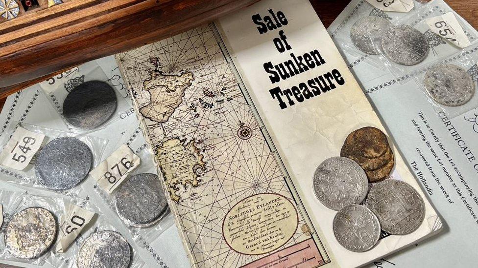 Coins and map