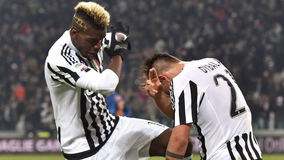 Footballers Paul Pogba and Paulo Dybala of Juventus do the dab during a Serie A game in Turin