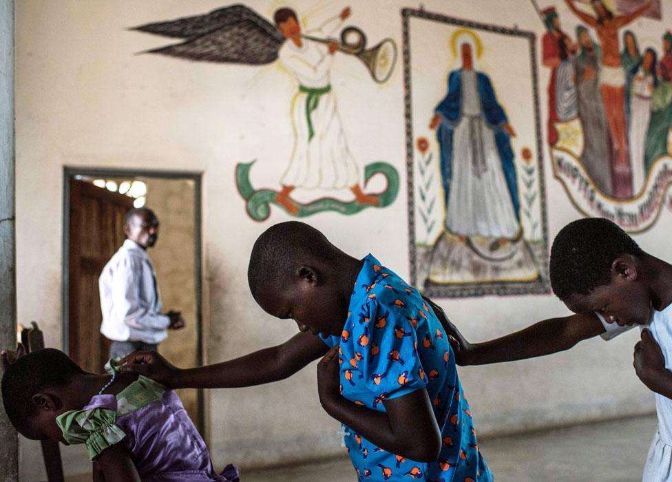 Girls praying at Mofolo Woyera church in Mulele village, Ghana - Sunday 11 September 2016