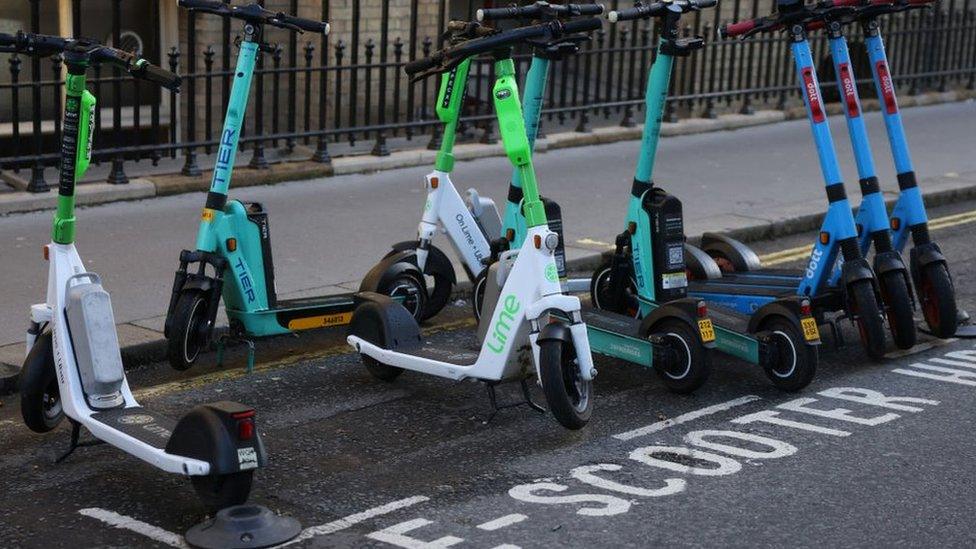 Scooters in parking bay