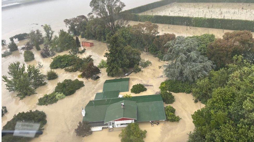 A house submerged by floodwaters