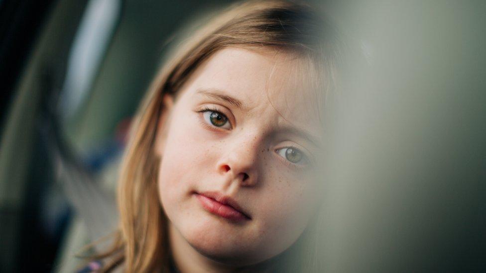 A child looking cross