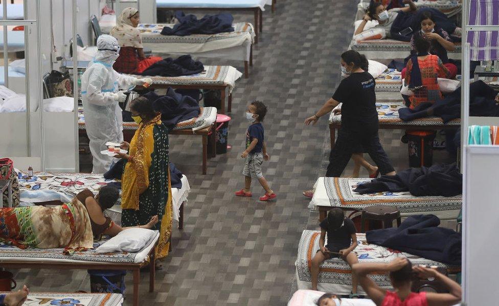 Covid-19 patients are seen inside the Commonwealth Games Village Sports Complex which was temporarily converted into a coronavirus care centre in New Delhi.