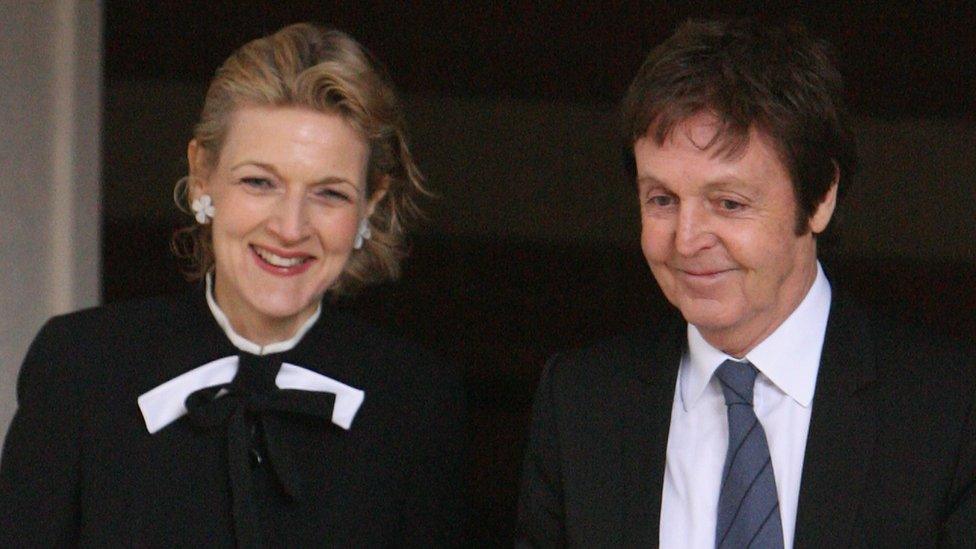 Sir Paul McCartney and his divorce lawyer Fiona Shackleton leave the High Court on 17 March 2008