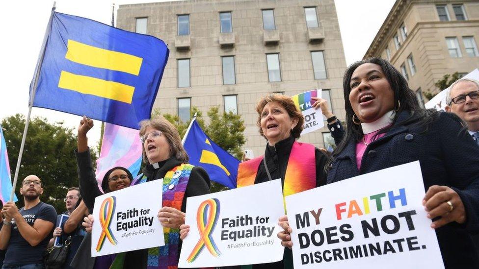 Demonstrators in favour of LGBT rights rally outside the US Supreme Court in Washington, DC, 8 October, 2019