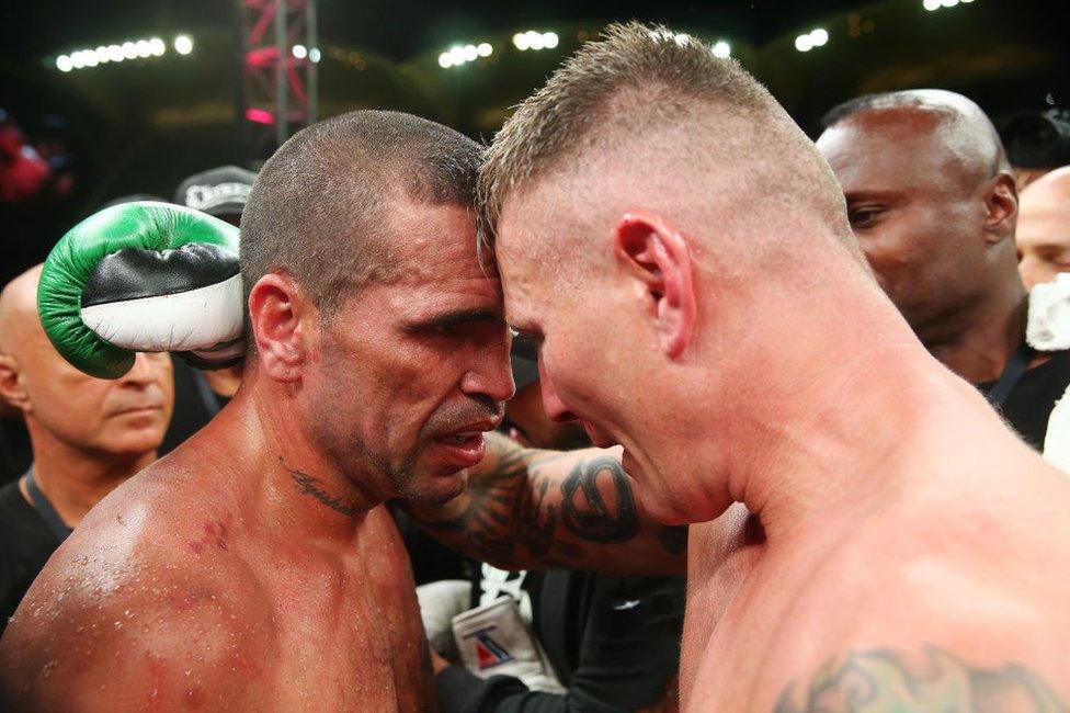 Australian boxers Anthony Mundine and Danny Green after their bout finished