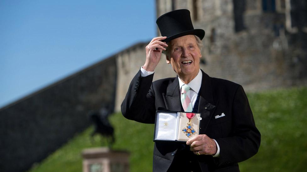 Nicholas Parsons with his Commander of the Order of the British Empire (CBE) medal given to him by Queen Elizabeth II at an Investiture ceremony at Windsor Castle on April 15, 2014