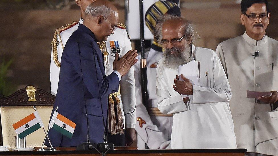 Bharatiya Janata Party (BJP) leader Pratap Chandra Sarangi greets President Ram Nath Kovind after taking oath as a Minister of State during the swearing-in ceremony of the NDA government, at Rashtrapati Bhavan, on May 30, 2019 in New Delhi, India.