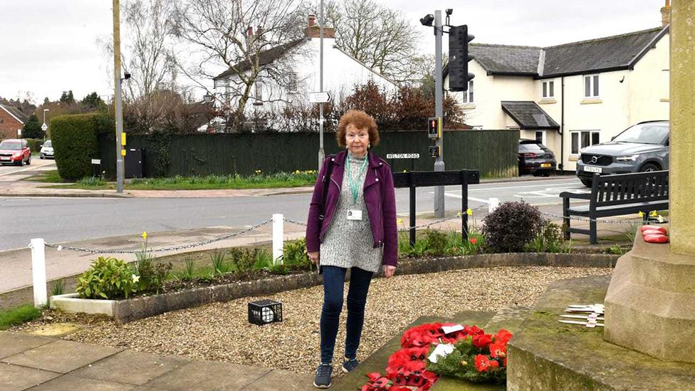 Coleen Gill by the war memorial