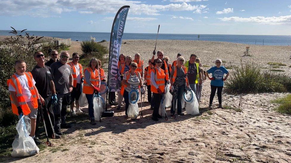 Beach cleaners at Carlyon Bay